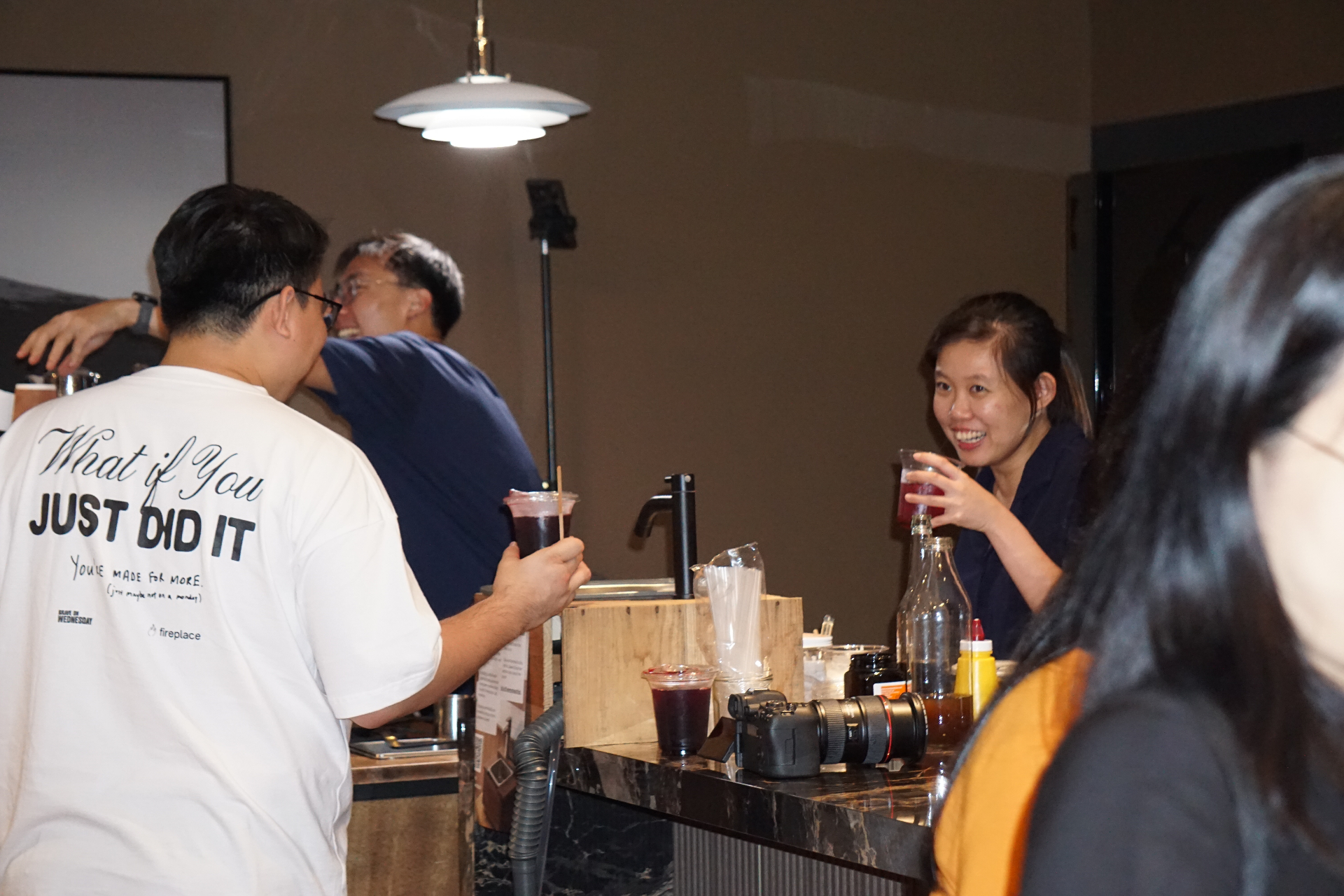 Guests enjoying drinks at event